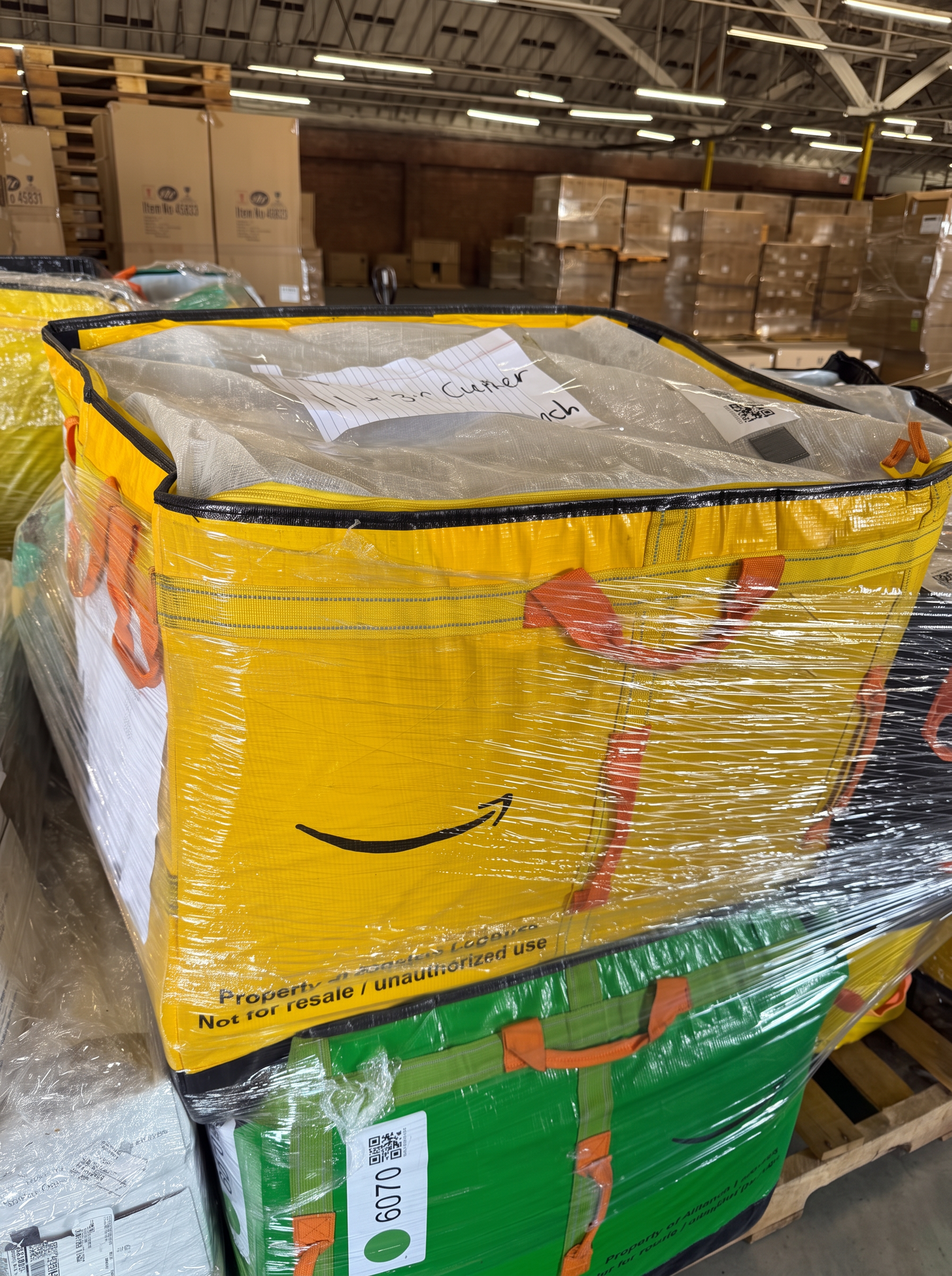 Amazon Logistics tote bag stretch-wrapped on a pallet and staged for outbound transfer at Logix Fulfillment Vernon CA