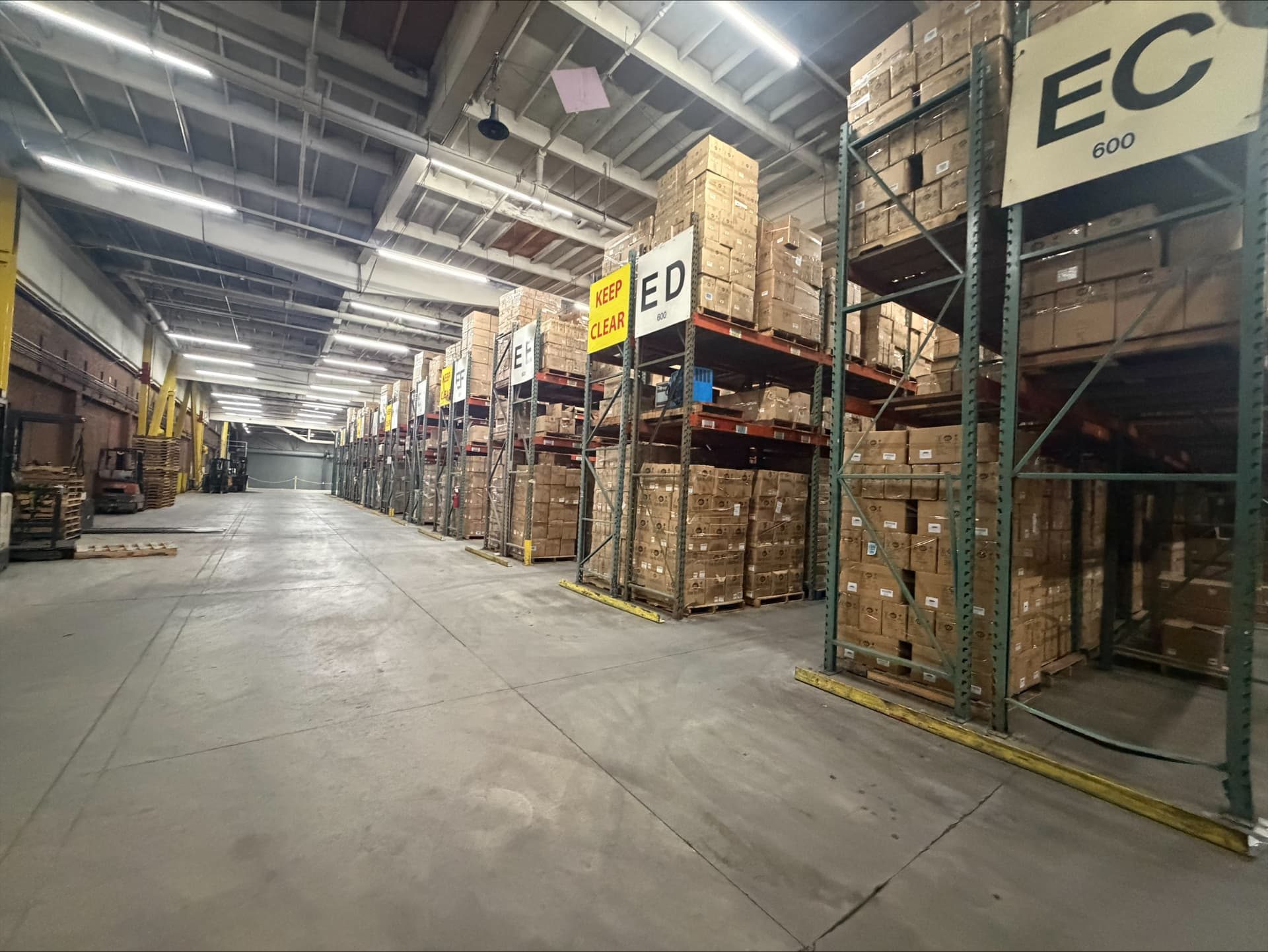 Racking aisles ED and EC along the warehouse wall at Logix Fulfillment in Vernon, CA